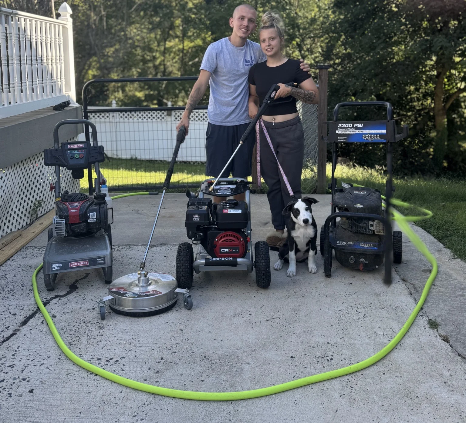 Birds Beware power-washing setup with crew and equipment