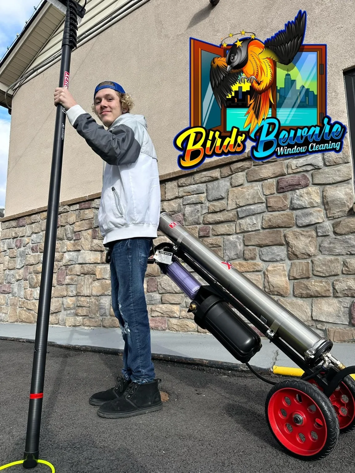 Early Birds Beware window-cleaning equipment and branding photo